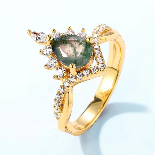 Stacked set of pear-cut natural moss agate rings in gold-plated sterling silver
