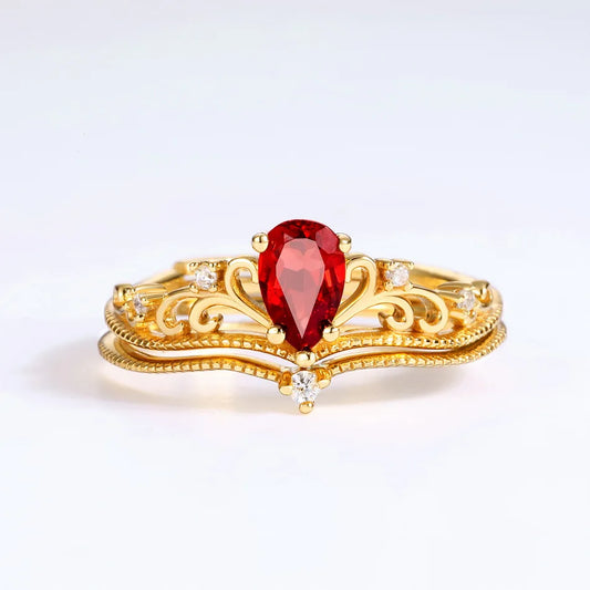 Crimson Crown Garnet Engagement Ring on hand