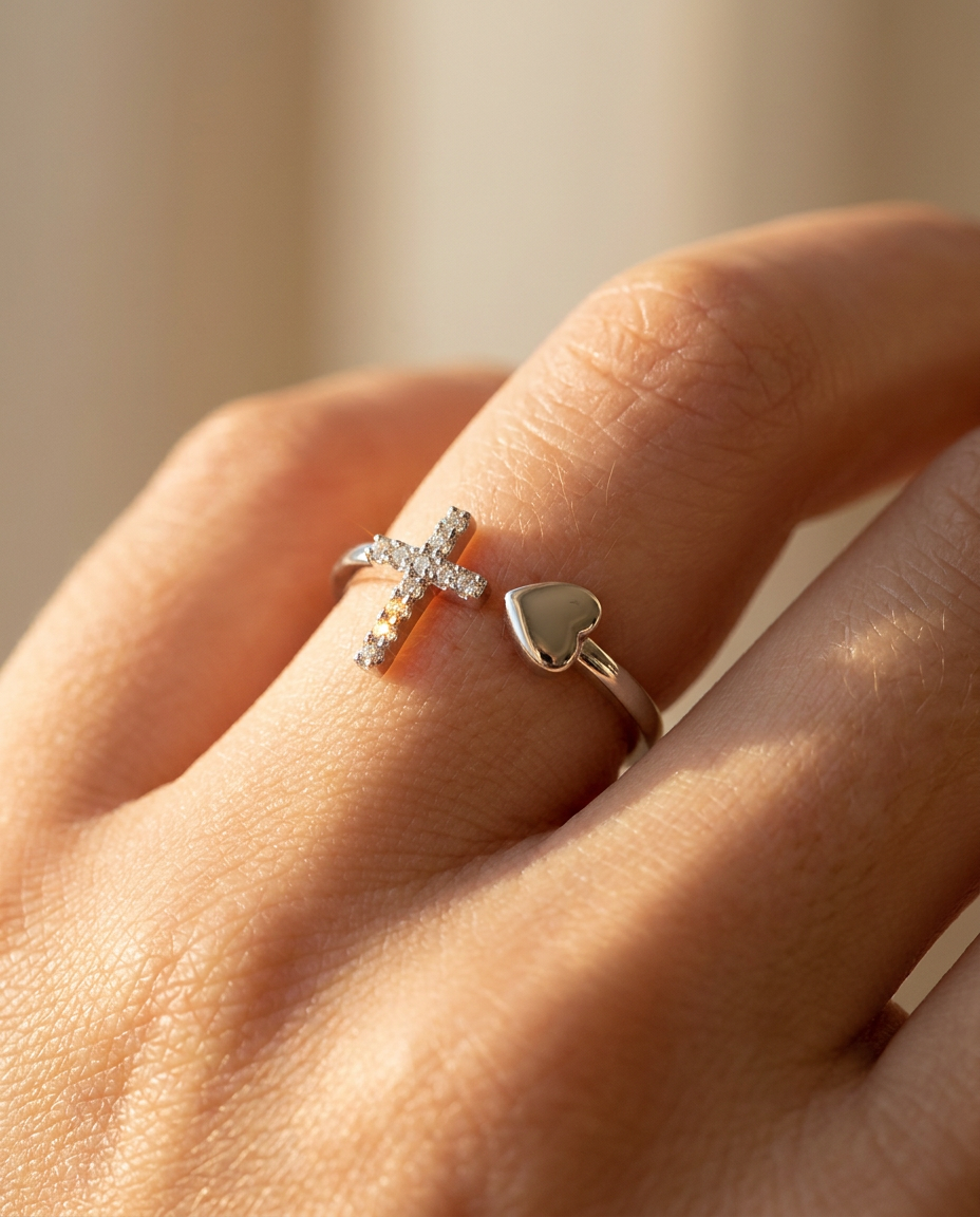 Close-up of the Cross & Heart Thin Ring worn on the hand, cubic zirconia in rhodium-plated sterling silver