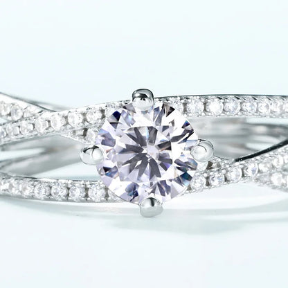 Crossover Twist Moissanite Solitaire Ring — round brilliant moissanite crossover ring in rhodium-plated sterling silver, view 5 of 5