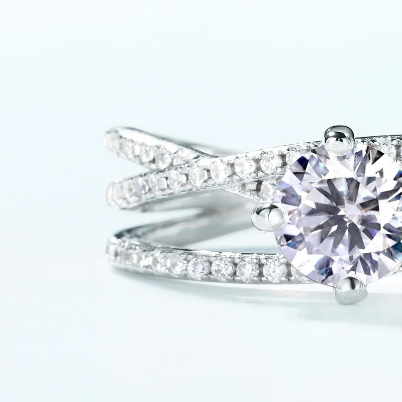 Crossover Twist Moissanite Solitaire Ring — round brilliant moissanite crossover ring in rhodium-plated sterling silver, view 4 of 5