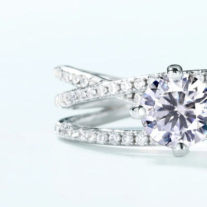 Crossover Twist Moissanite Solitaire Ring — round brilliant moissanite crossover ring in rhodium-plated sterling silver, view 4 of 5