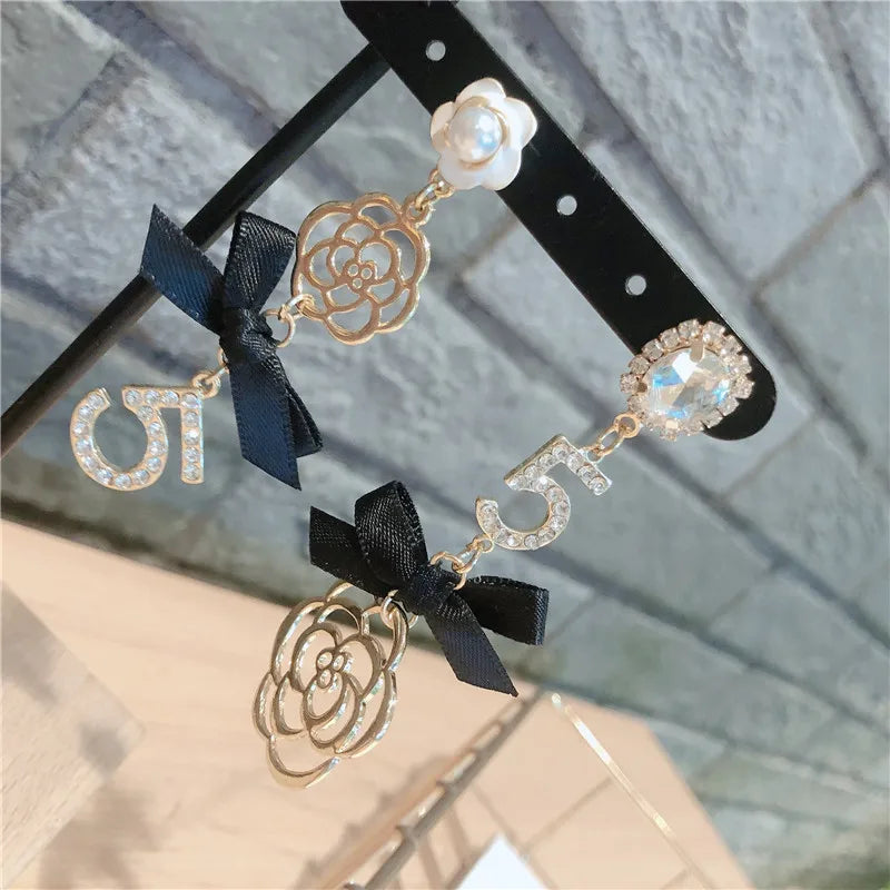 Women earring cc style ladies Vintage Black Camellia Earrings with rhinestone Fashion Earrings with Simple Bowknot Earrings