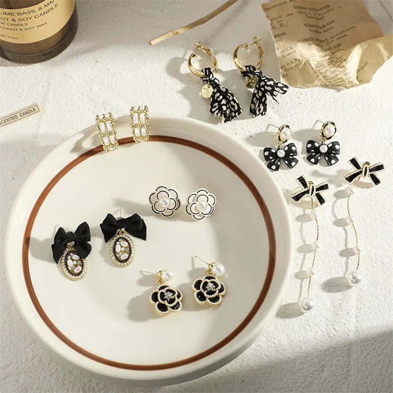 Women earring cc style ladies Vintage Black Camellia Earrings with rhinestone Fashion Earrings with Simple Bowknot Earrings