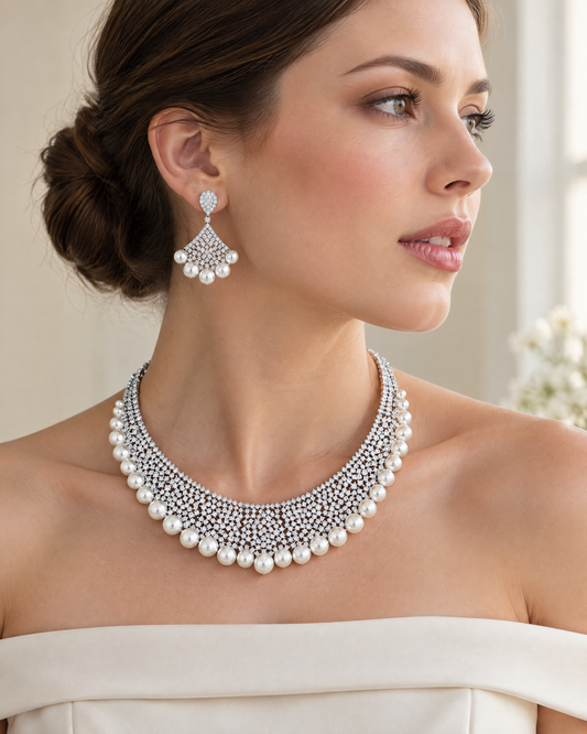 Model wearing the Pearl Fringe Collar Set, pearls and cubic zirconia in rhodium-plated settings