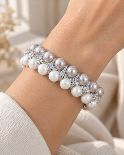 Wrist wearing the Double Row Pearl Bracelet, pearls and cubic zirconia in rhodium-plated settings