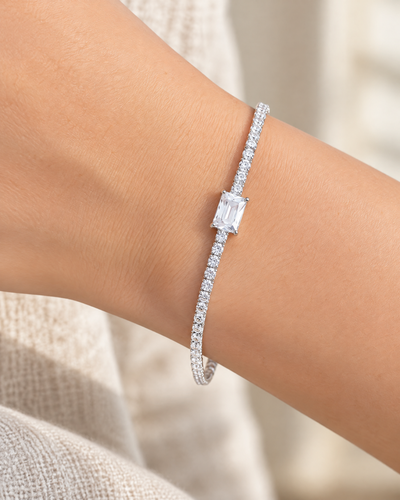 Wrist wearing the Princess-Cut Solitaire Tennis Bracelet, cubic zirconia in rhodium-plated sterling silver