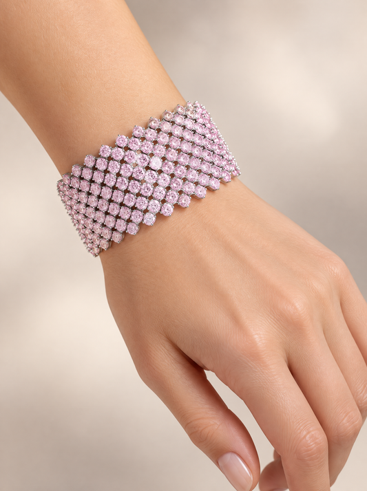 Blush Pave Mesh Cuff Bracelet worn on the wrist, rhodium-plated mesh of pale pink zirconia