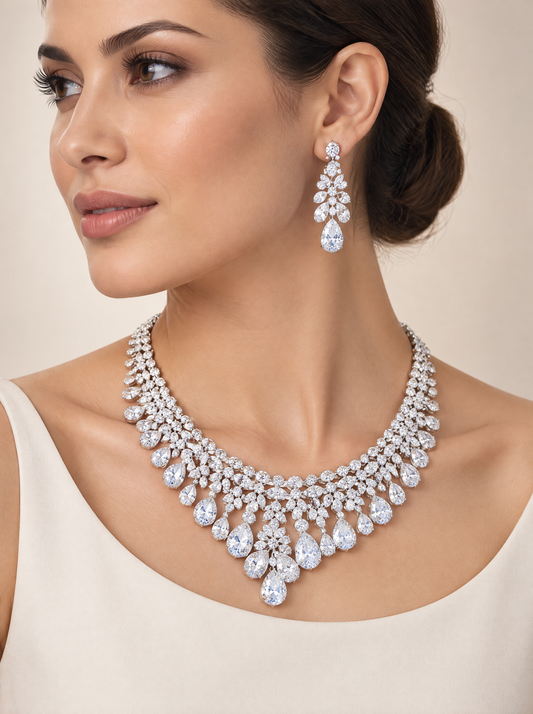 Dubai Radiance Necklace and Earring Duo worn, rhodium-plated white zirconia bib with pear-cut fringe